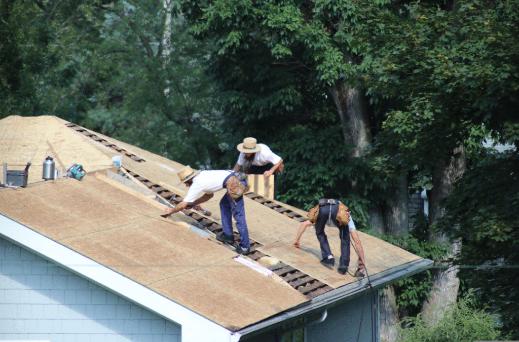 Instructor demonstrating room-in-the-roof insulation installation.